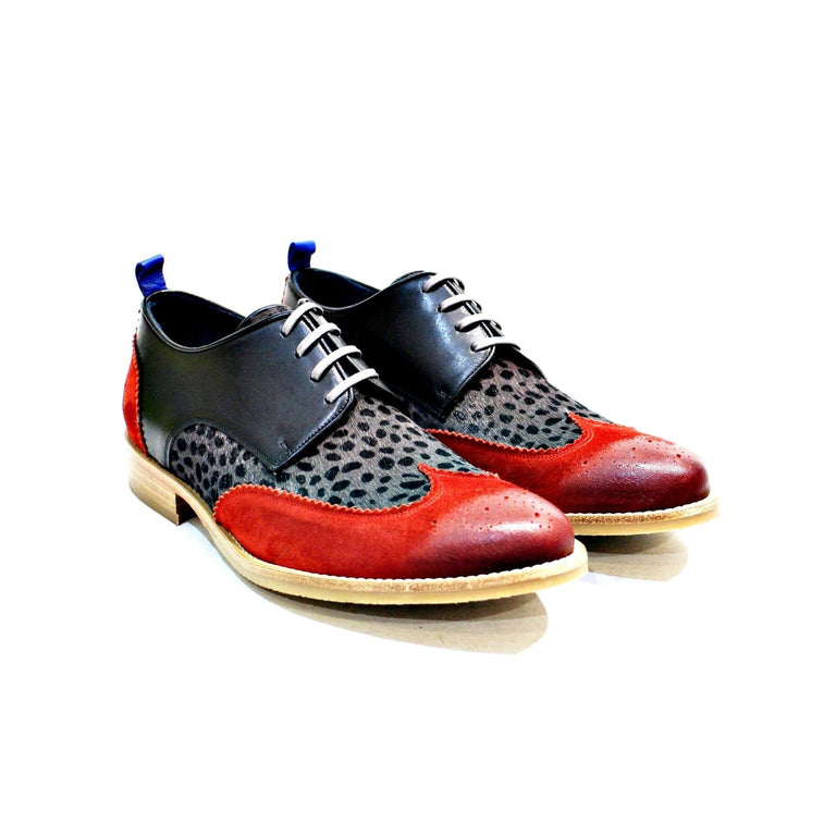 Shoe consisting of suede, hair and leather, lining and leather sole with rubber track, iCon model. Handmade in Portugal. “Walk with Pintta”