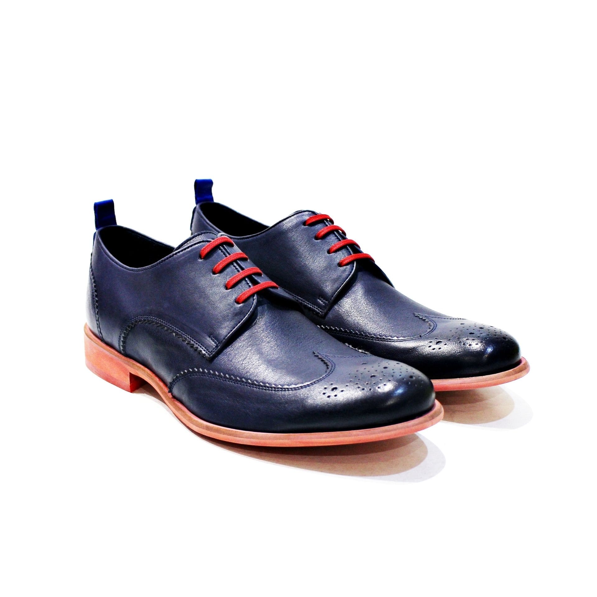 Shoe consisting of leather inwardly and externally, with red rubber sole. “Walk with Pintta”