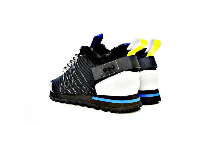 Sneaker consisting of leather, fabric and suede, with dowels for metal, lined full hair. Handmade in Portugal. “Walk with Pintta”