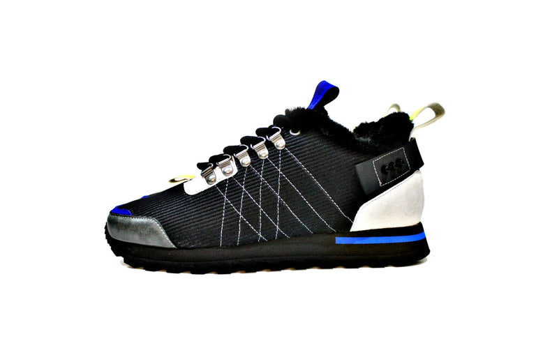 Sneaker consisting of leather, fabric and suede, with dowels for metal, lined full hair. Handmade in Portugal. “Walk with Pintta”