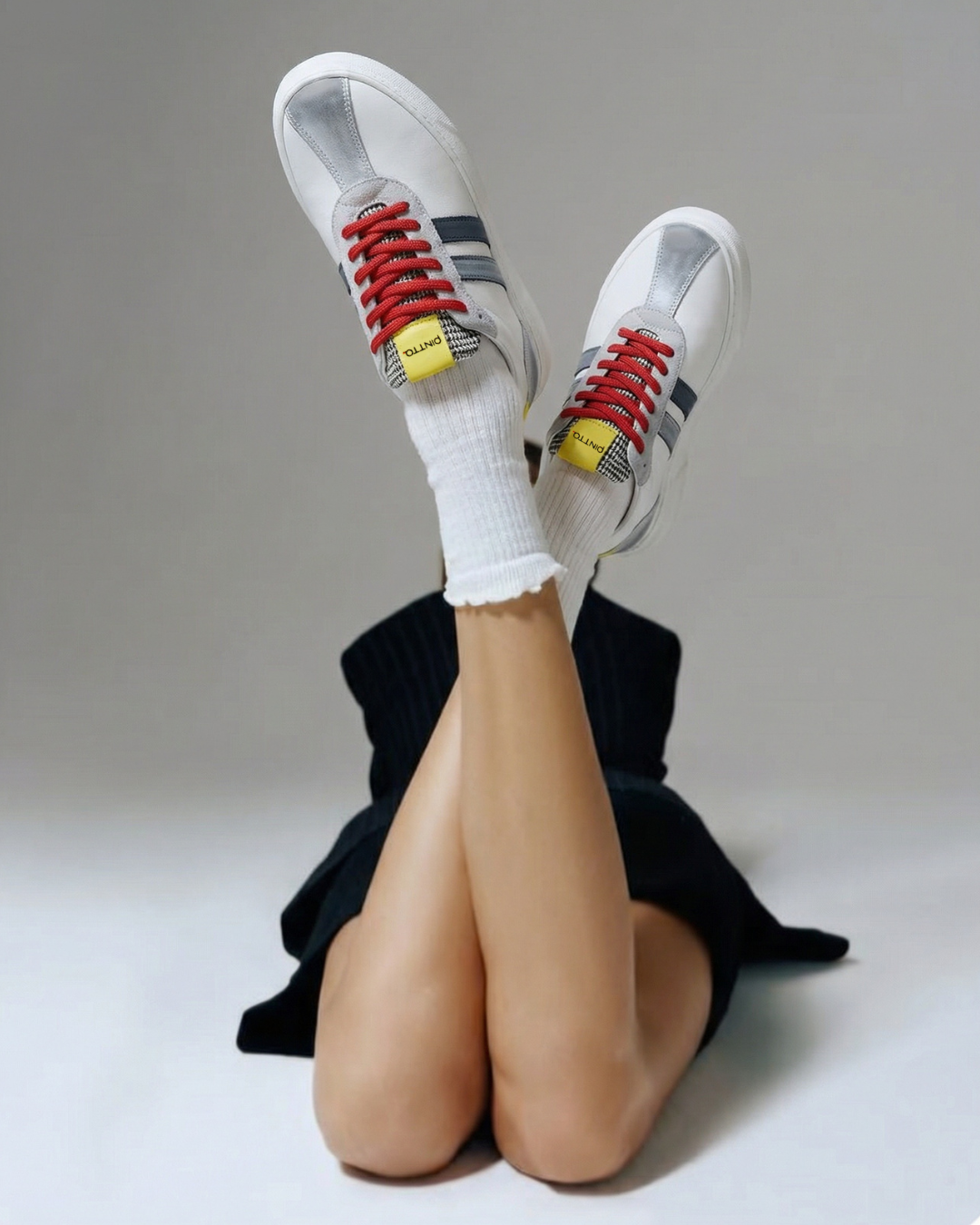 Pintta Rocha Yellow women’s sneakers in white leather with red laces and yellow accent, contemporary European luxury footwear