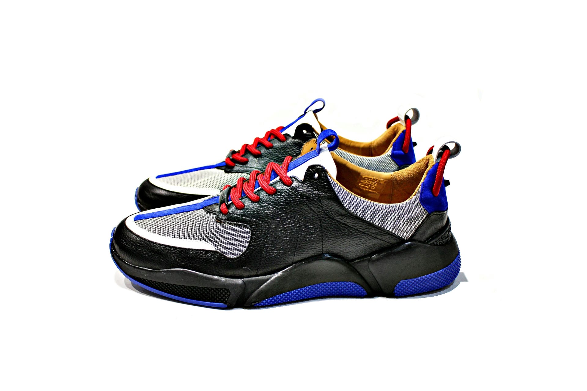 Sneaker composed of leather and metallic fabric, suede, rubber sole, leather lining.
