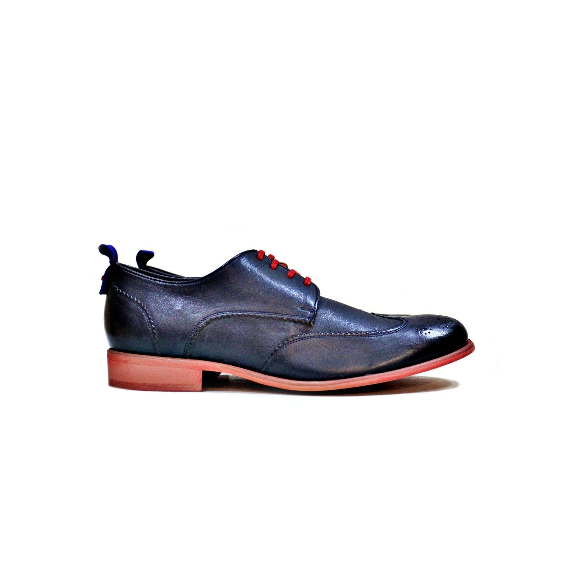 Shoe consisting of leather inwardly and externally, with red rubber sole. “Walk with Pintta”