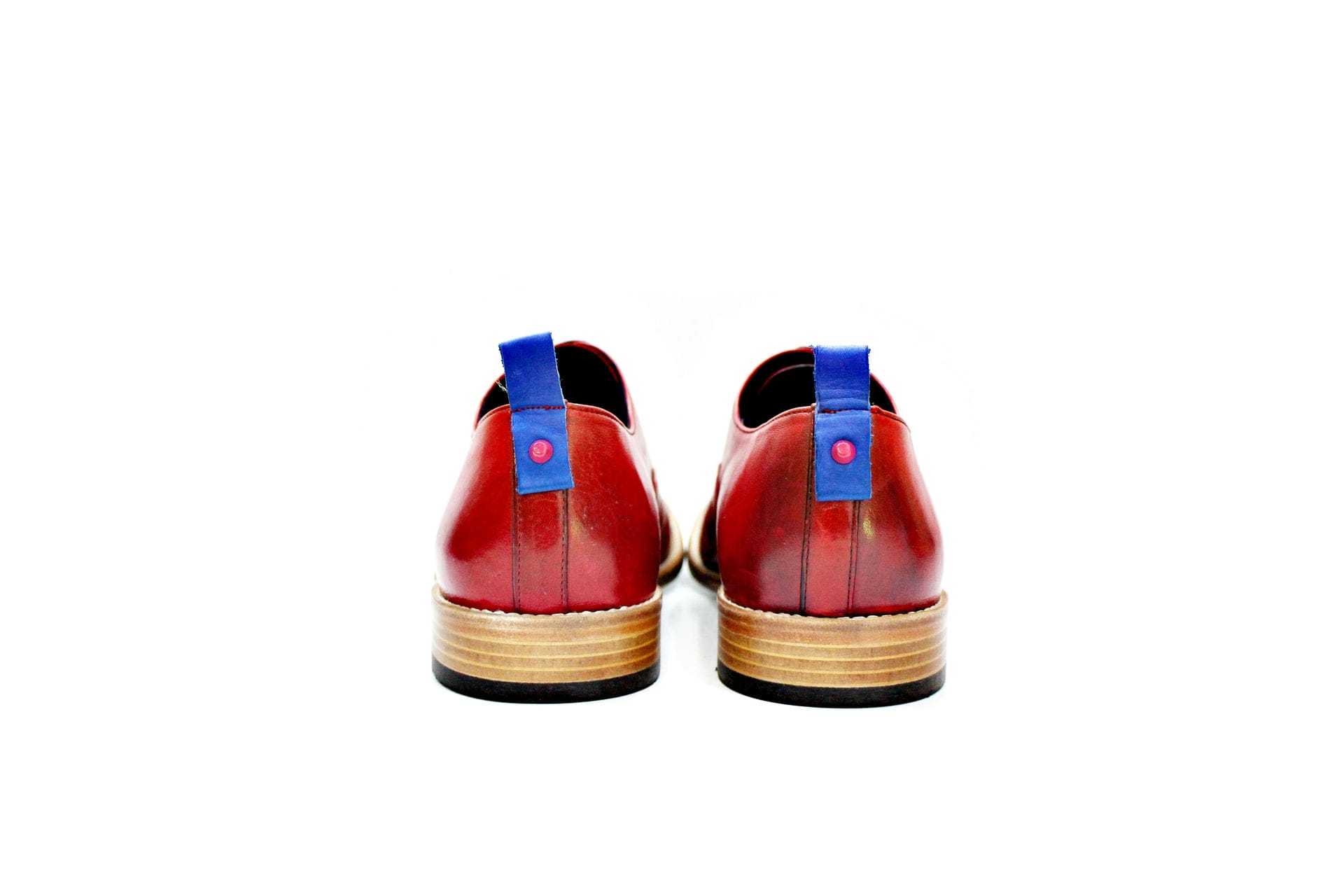 Shoe consisting of red leather externally, with cow lining made to this. “Walk with pintta”